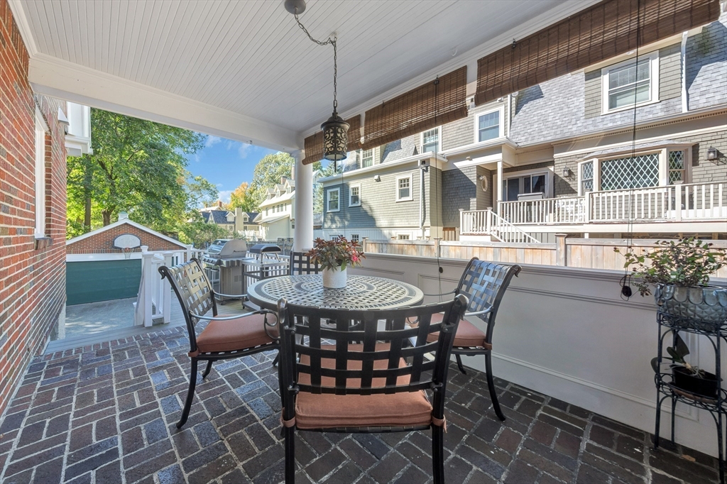 58 Bacon Street Winchester, MA 01890 - Photo 10 of 40 a dining room with furniture and window