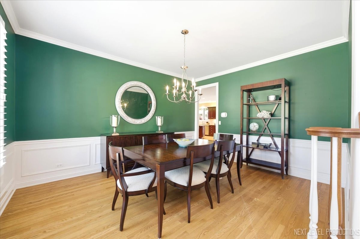 1914 North Ridge Avenue Arlington Heights, IL 60004 - Photo 8 of 50 a view of a dining room with furniture window and wooden floor