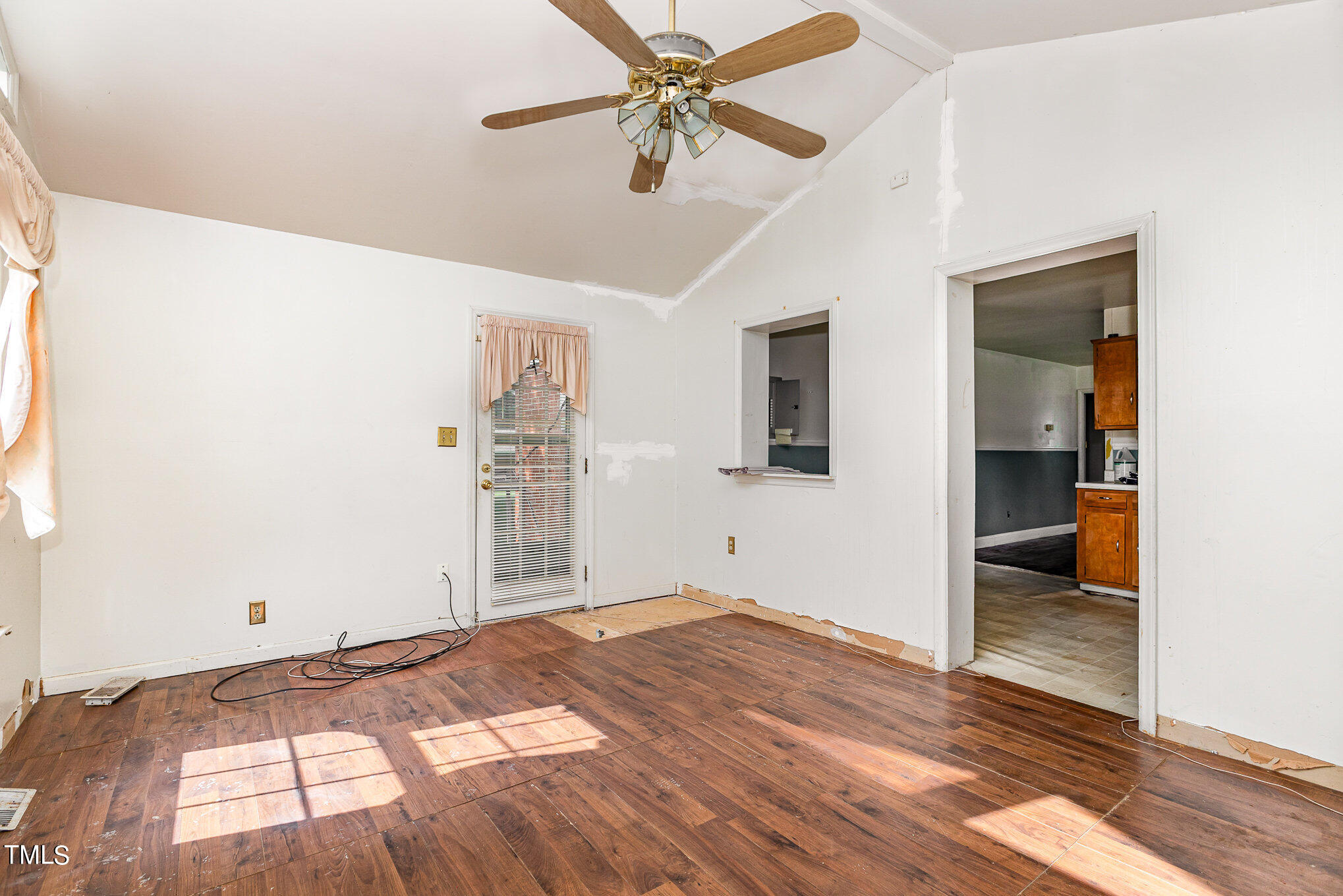 812 Hadley Road Raleigh, NC 27610 - Photo 10 of 15 Bonus Room leading into the Kitchen