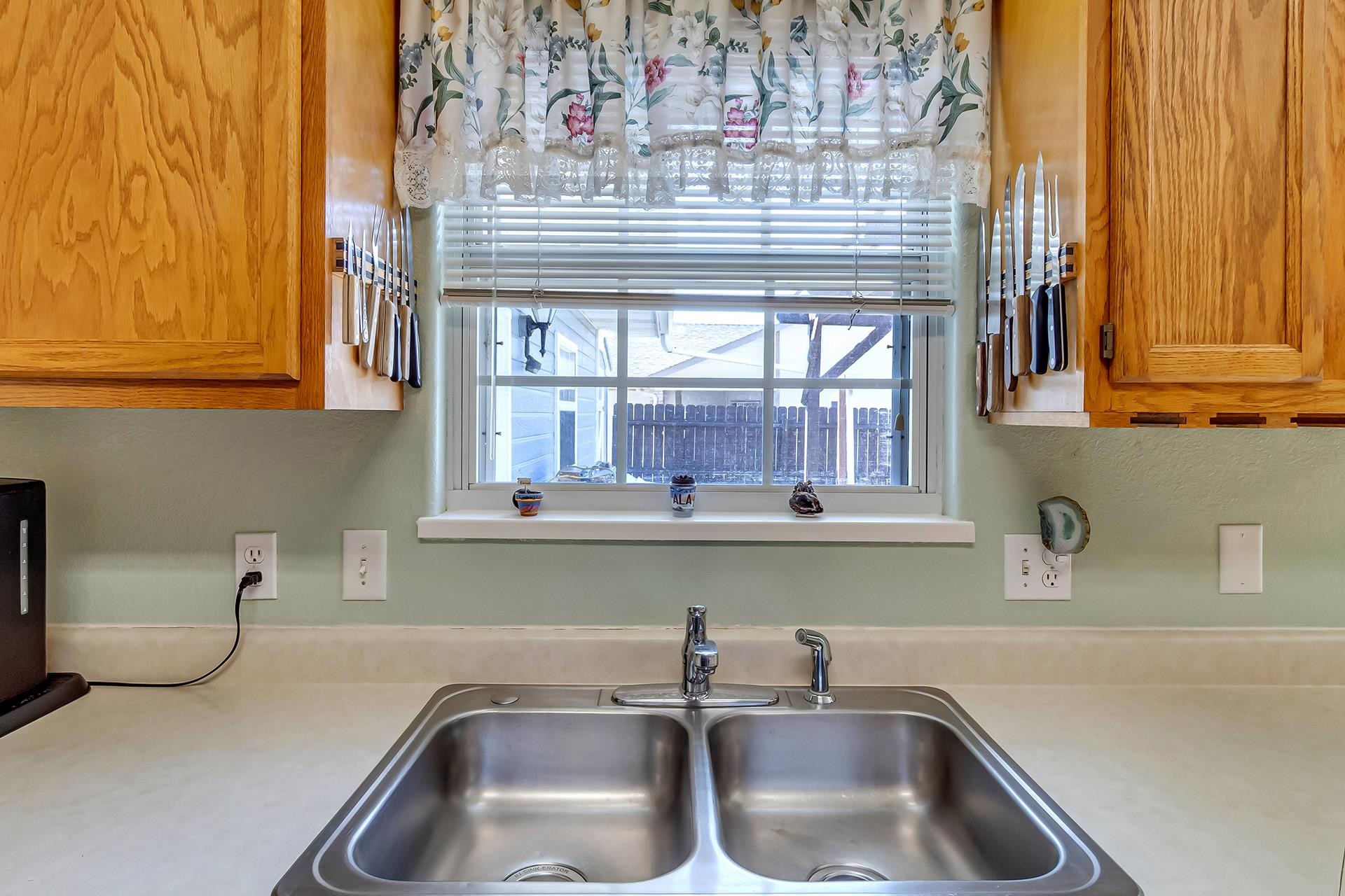 110 Sunset Drive Fruita, CO 81521 - Photo 12 of 39 a kitchen with a sink and cabinets