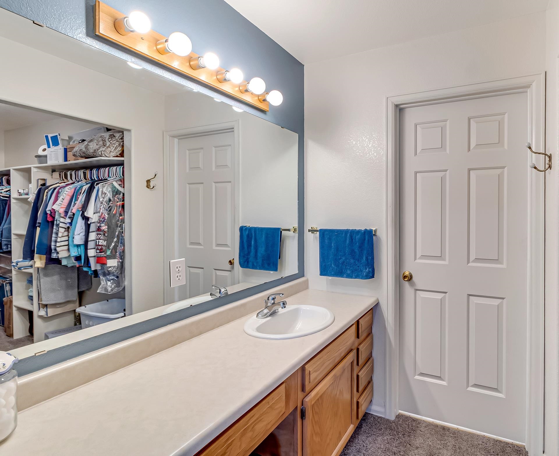 110 Sunset Drive Fruita, CO 81521 - Photo 20 of 39 a bathroom with a sink double vanity and a mirror