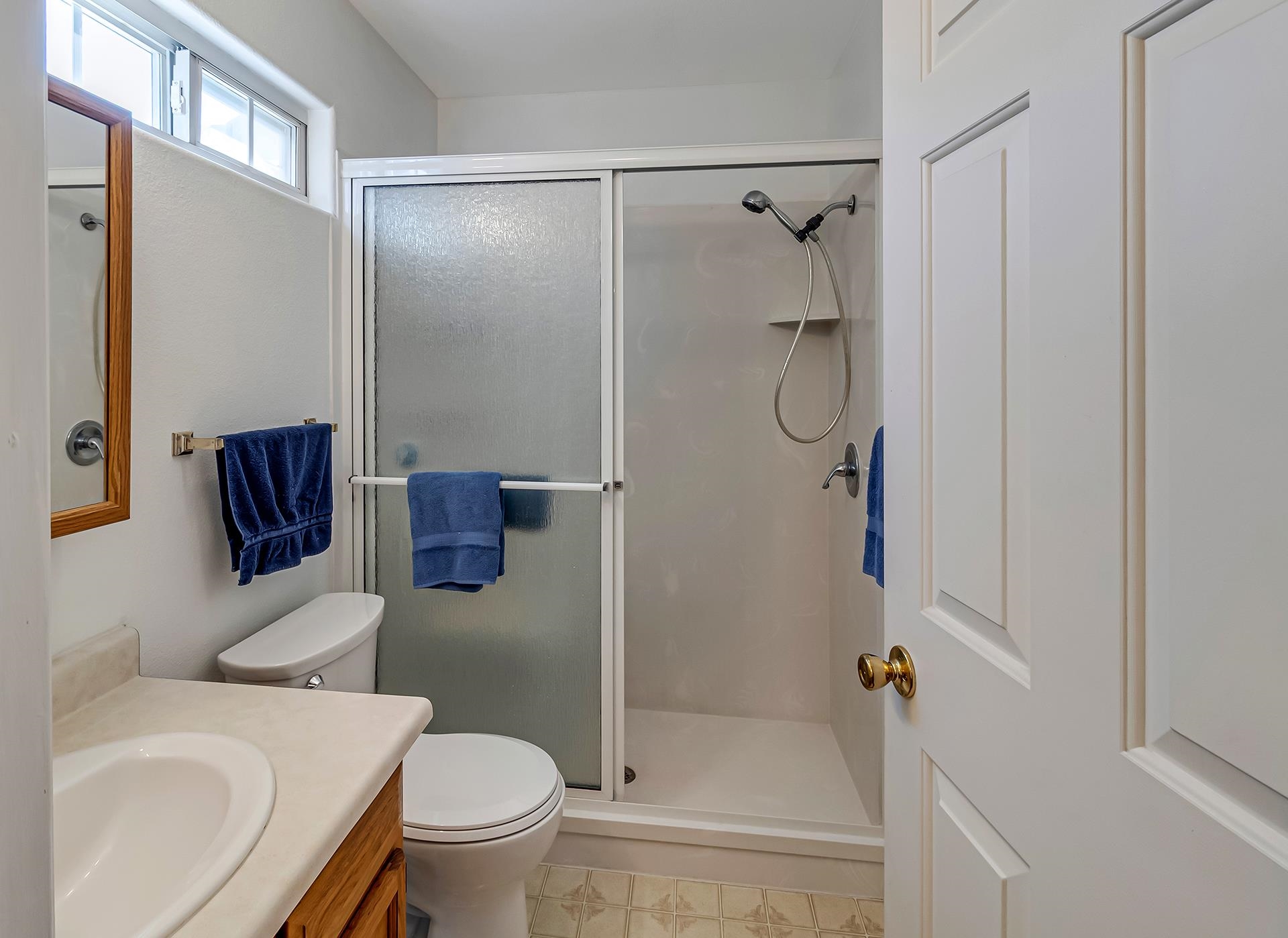 110 Sunset Drive Fruita, CO 81521 - Photo 22 of 39 a bathroom with a shower a toilet and a sink