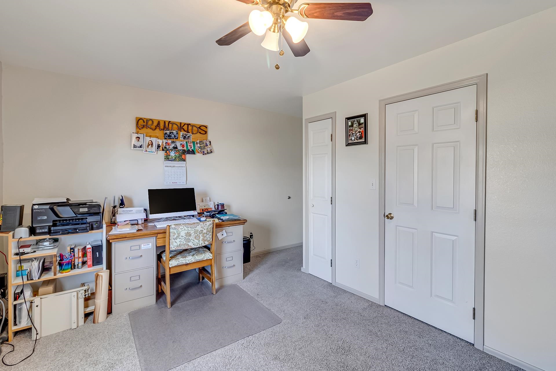 110 Sunset Drive Fruita, CO 81521 - Photo 27 of 39 a view of a workspace with furniture and a window