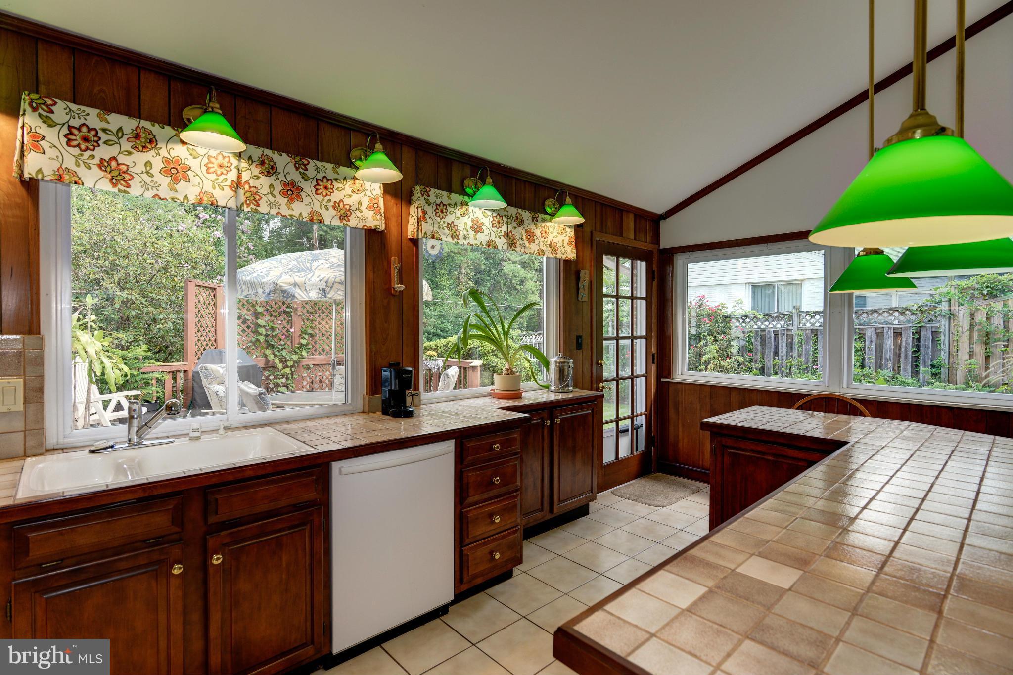 7522 Havelock Street Springfield, VA 22150 - Photo 14 of 30 a large kitchen with a large window and kitchen view