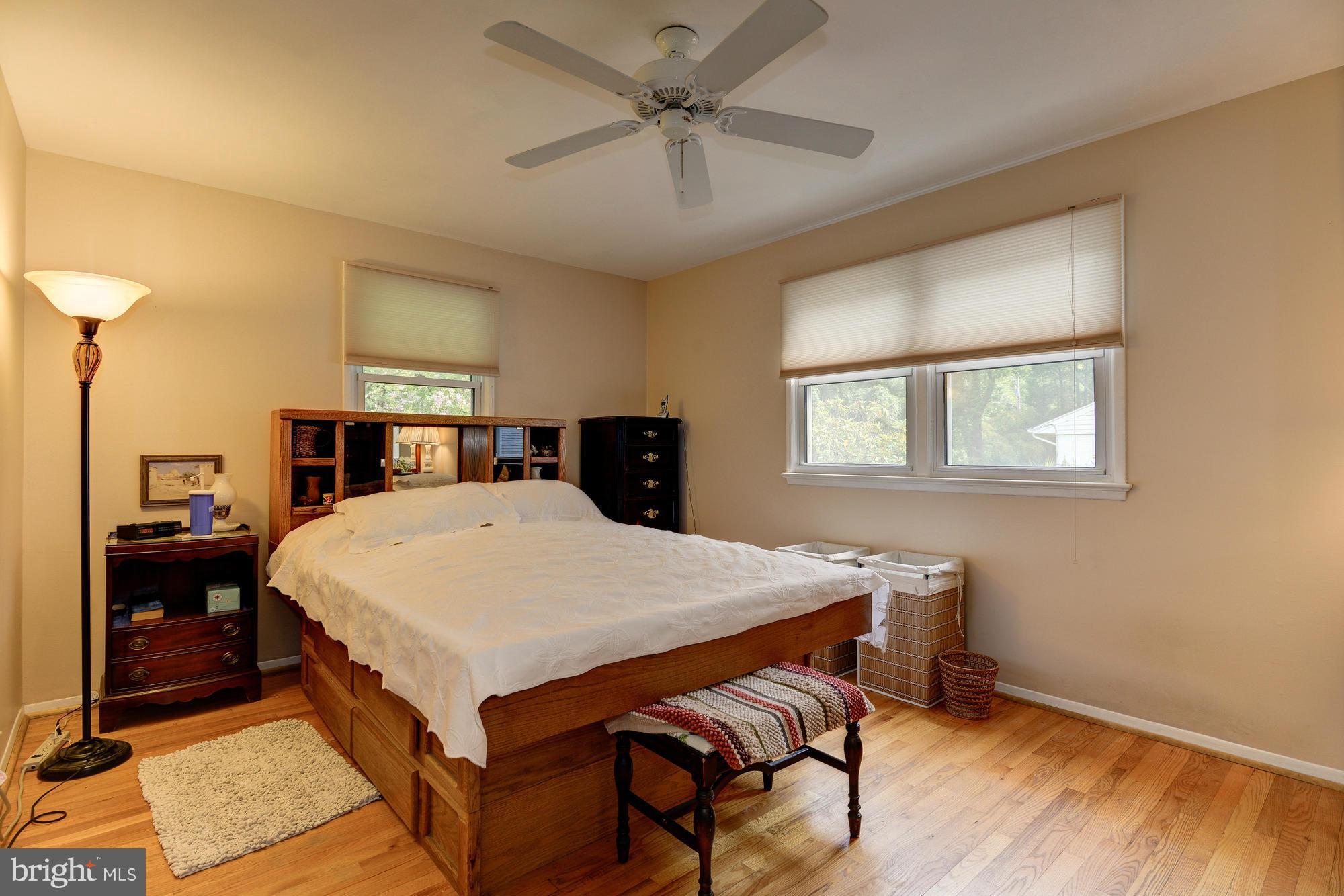 7522 Havelock Street Springfield, VA 22150 - Photo 15 of 30 a bed sitting in a bedroom and table