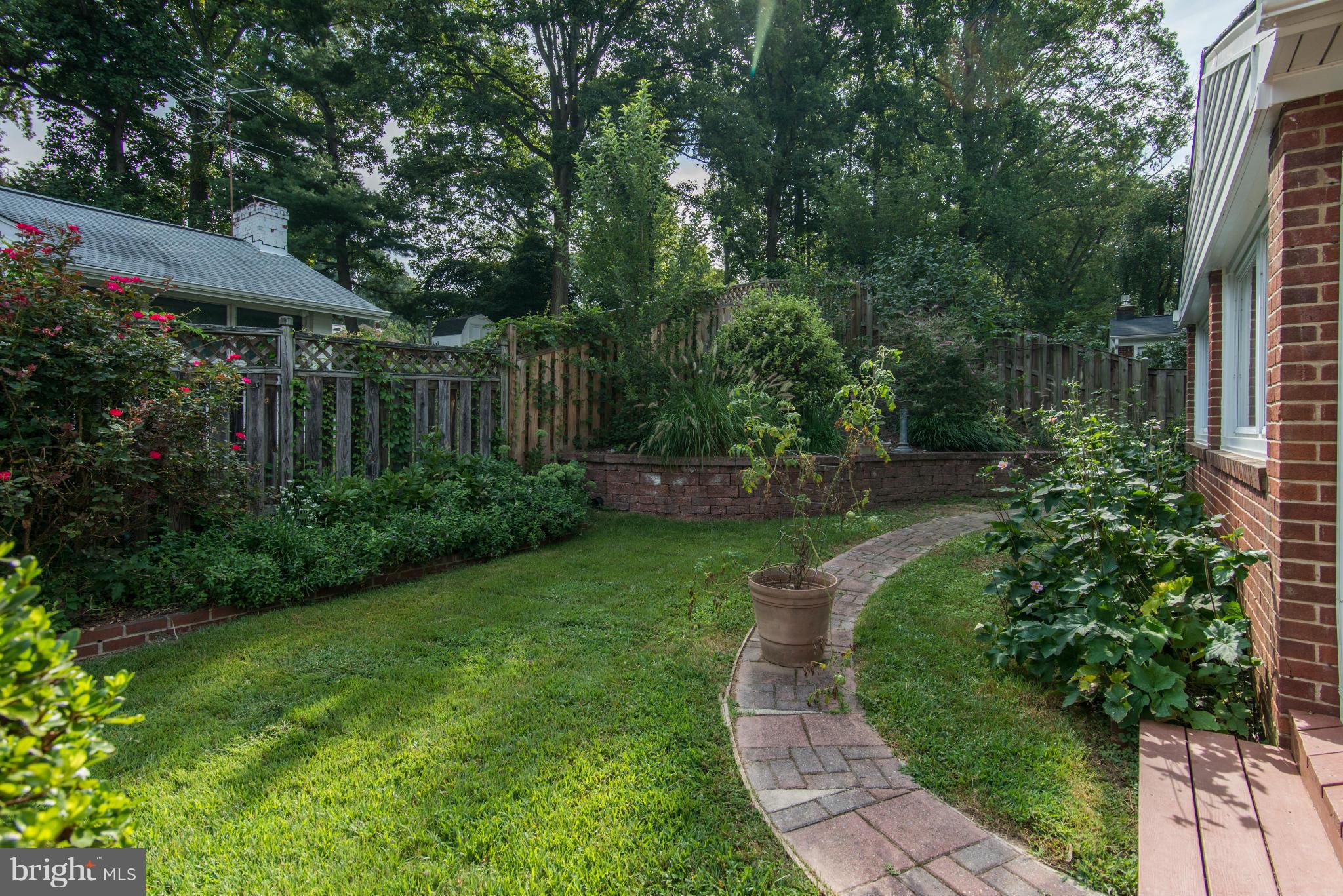 7522 Havelock Street Springfield, VA 22150 - Photo 27 of 30 a view of garden with patio