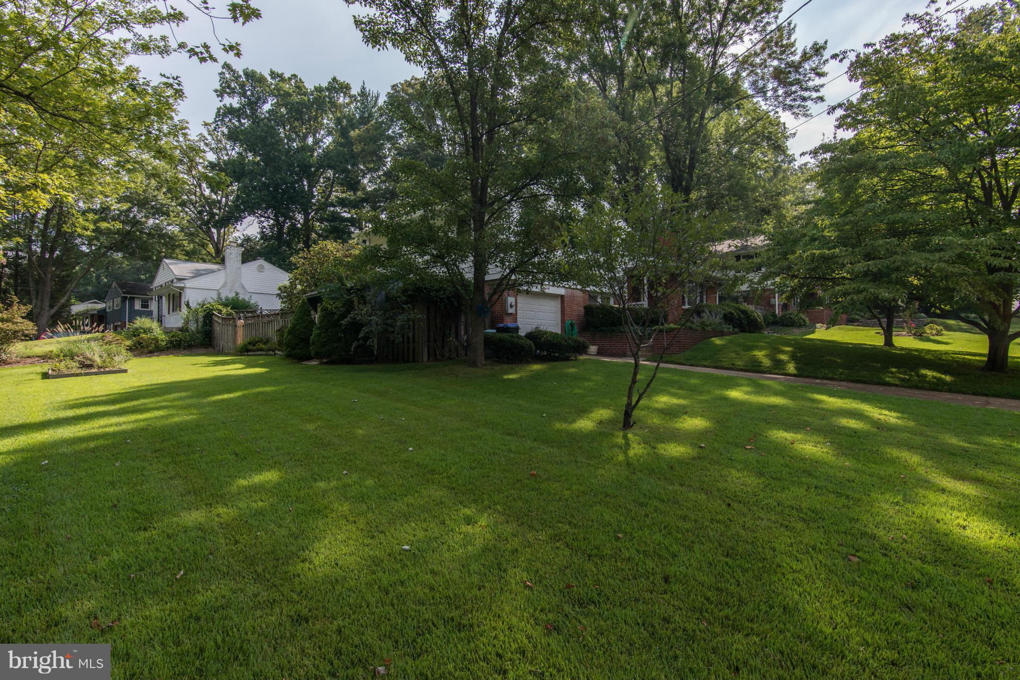 7522 Havelock Street Springfield, VA 22150 - Photo 30 of 30 a view of an house with backyard
