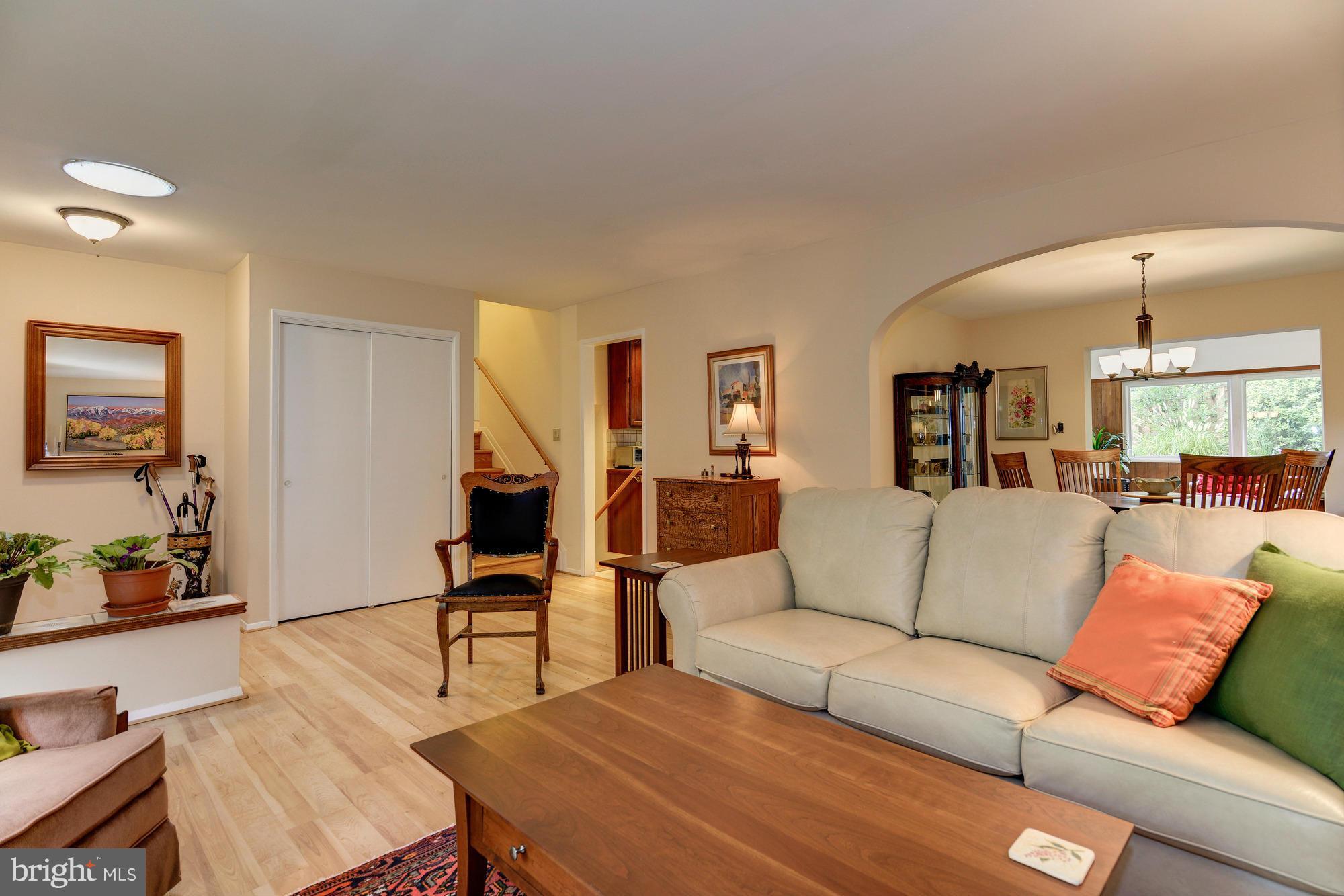 7522 Havelock Street Springfield, VA 22150 - Photo 7 of 30 a living room with furniture and wooden floor