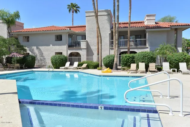 a view of a house with a swimming pool