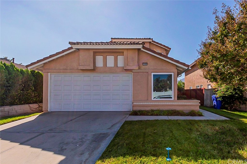 15509 Old Castle Road Fontana, CA 92337 - Photo 1 of 1 a front view of house with yard