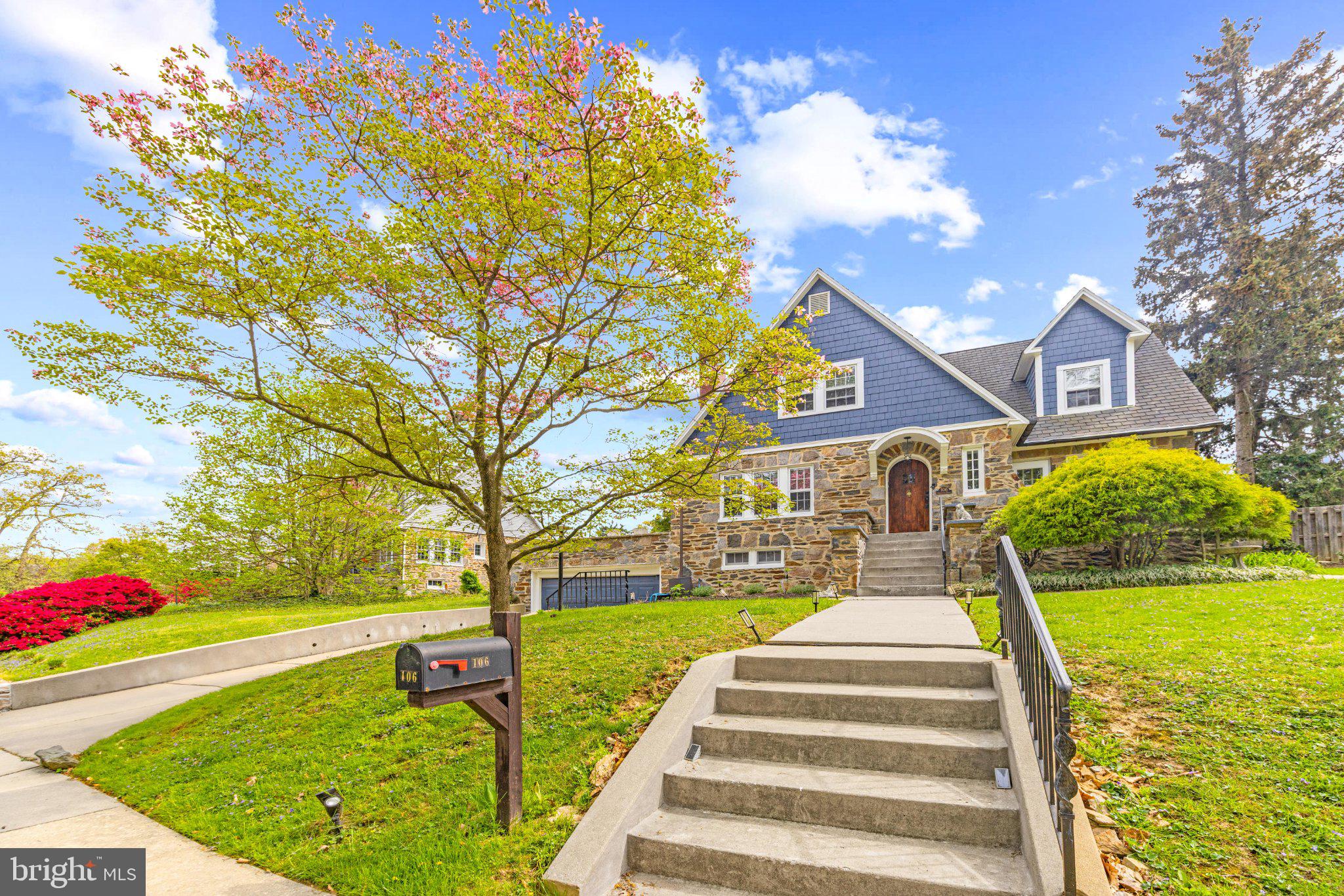 106 Edgewood Road Baltimore, MD 21286 - Photo 3 of 42 Charming stone home with vibrant landscaping.