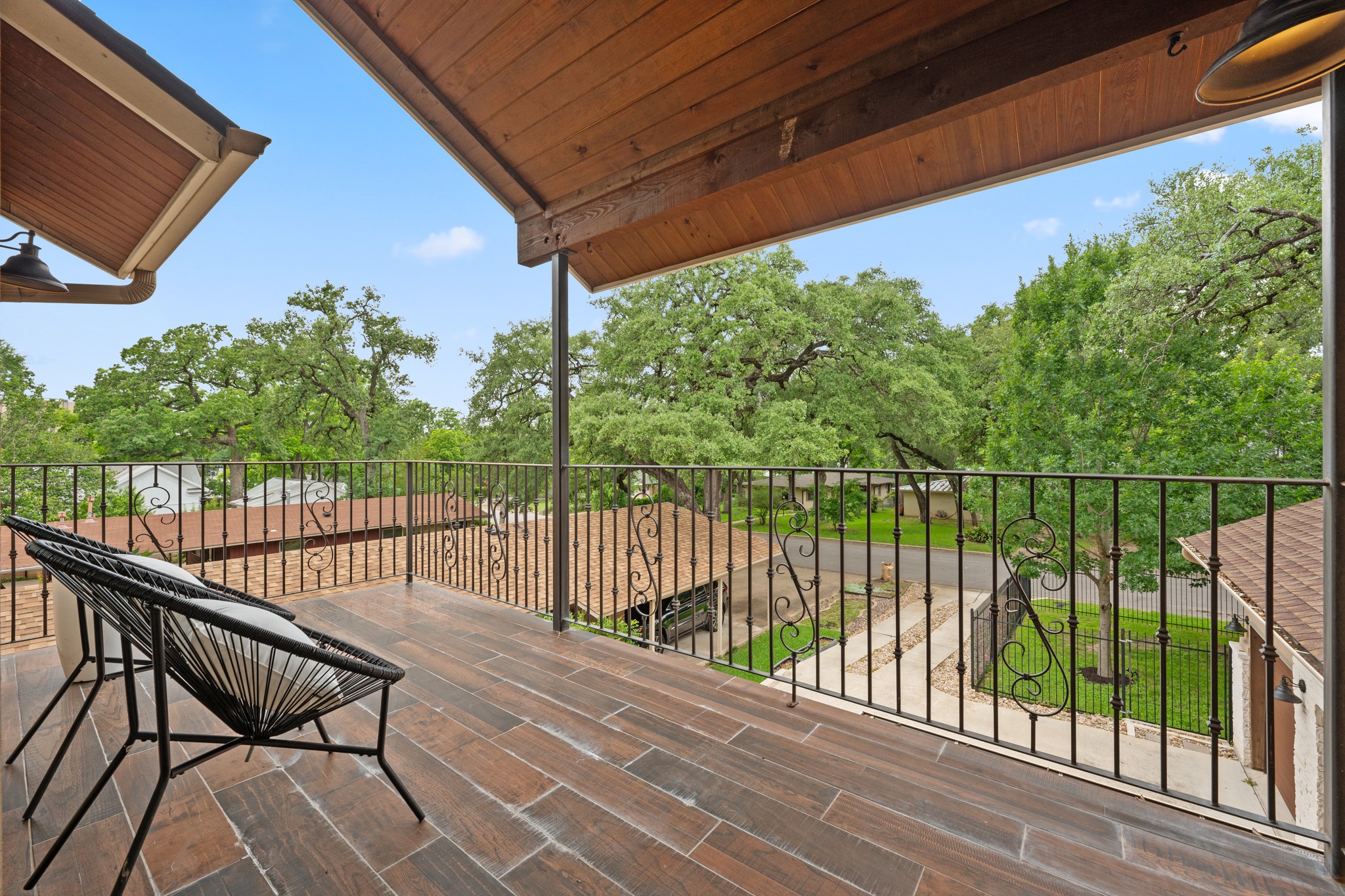 3907 Bailey Lane Austin, TX 78756 - Photo 24 of 40 Through the sliding glass door, the balcony extends the game room space on warm summer days.
