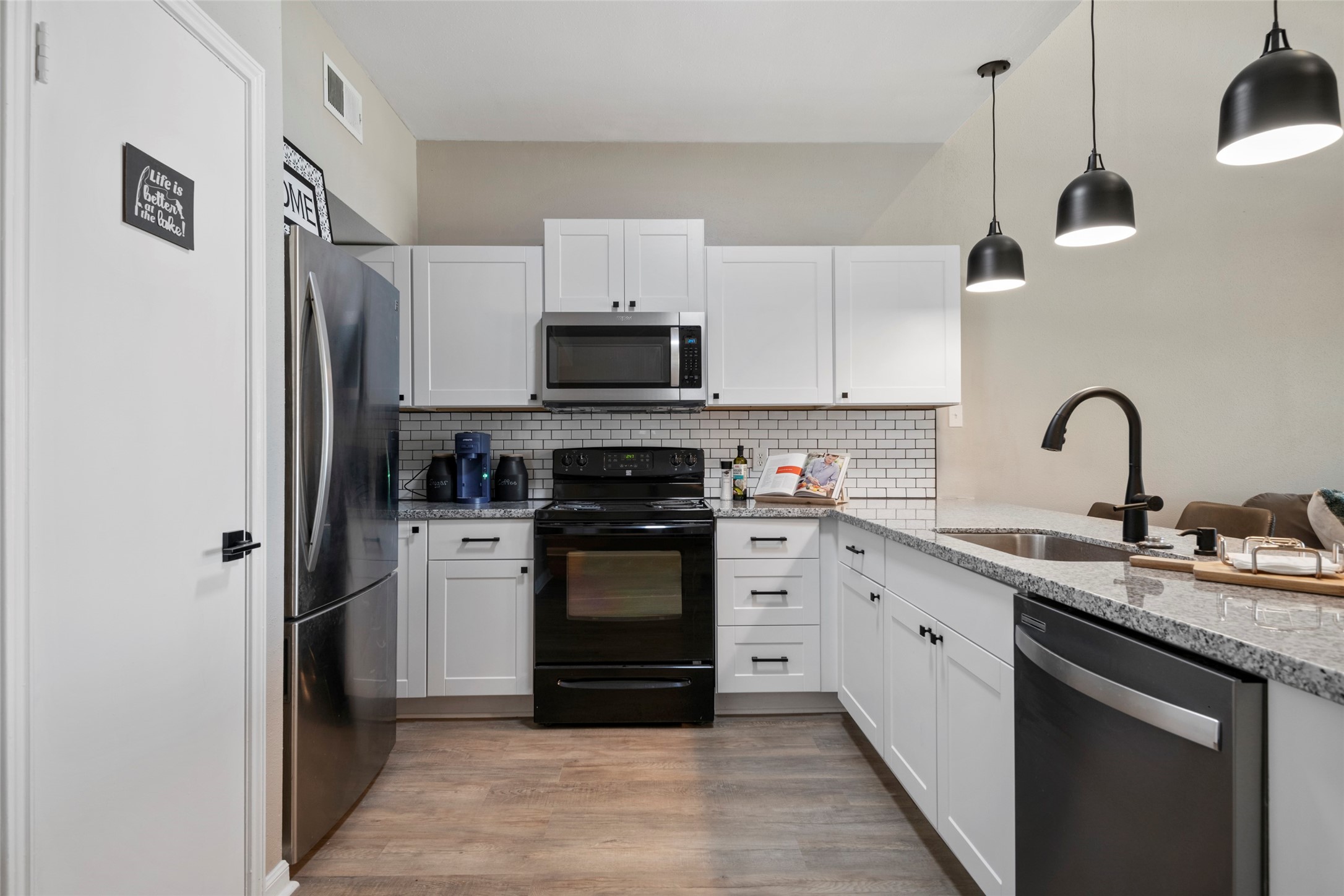 162 April Point Drive South Conroe, TX 77356 - Photo 7 of 26 Recently renovated kitchen. Lots of cabinet space!