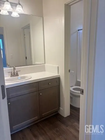 a bathroom with a double vanity sink and mirror