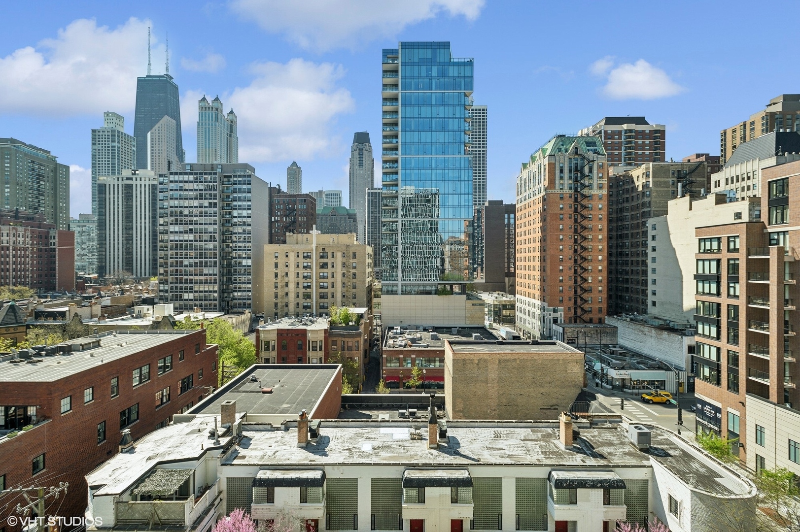 1 East Scott Street, Unit 1006 Chicago, IL 60610 - Photo 12 of 15 a view of city with tall buildings