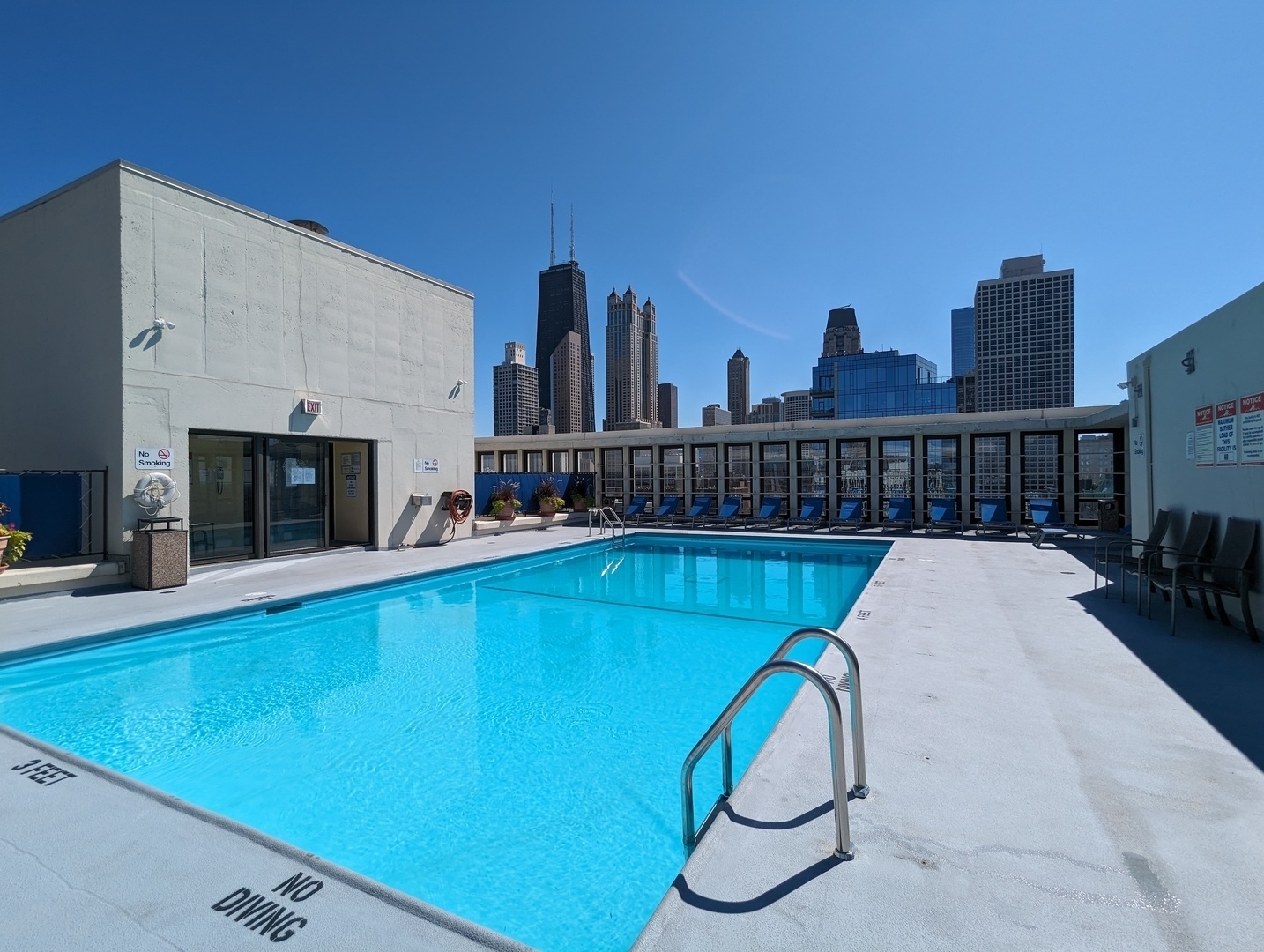 1 East Scott Street, Unit 1006 Chicago, IL 60610 - Photo 13 of 15 a view of a swimming pool with a roof deck