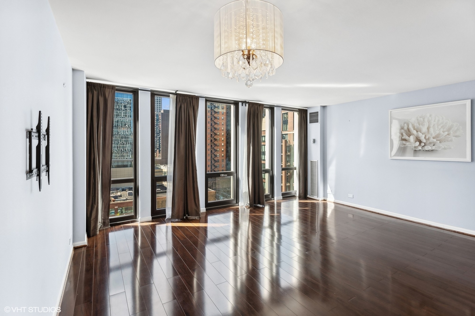 1 East Scott Street, Unit 1006 Chicago, IL 60610 - Photo 3 of 15 a view of an entryway with wooden floor