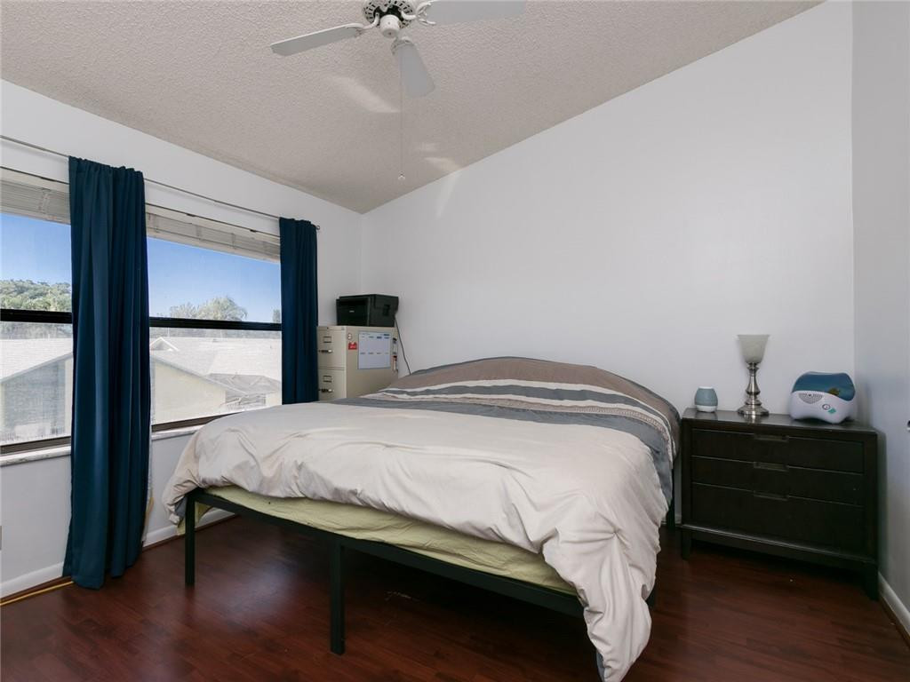 9112 Southwest 21st Court, Unit F Boca Raton, FL 33428 - Photo 18 of 34 a bedroom with a bed and a closet