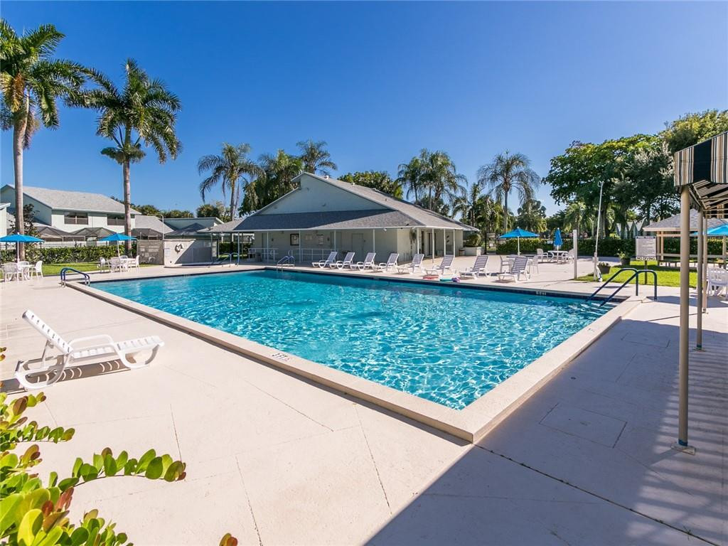 9112 Southwest 21st Court, Unit F Boca Raton, FL 33428 - Photo 28 of 34 a view of swimming pool with a patio