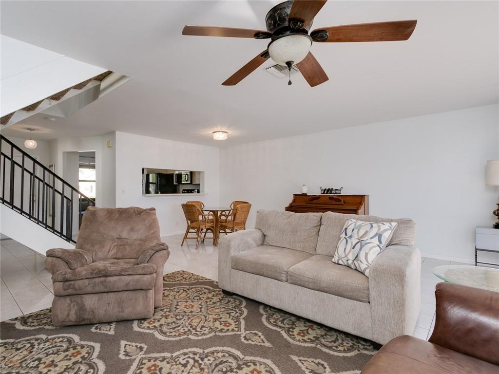 9112 Southwest 21st Court, Unit F Boca Raton, FL 33428 - Photo 7 of 34 a living room with furniture