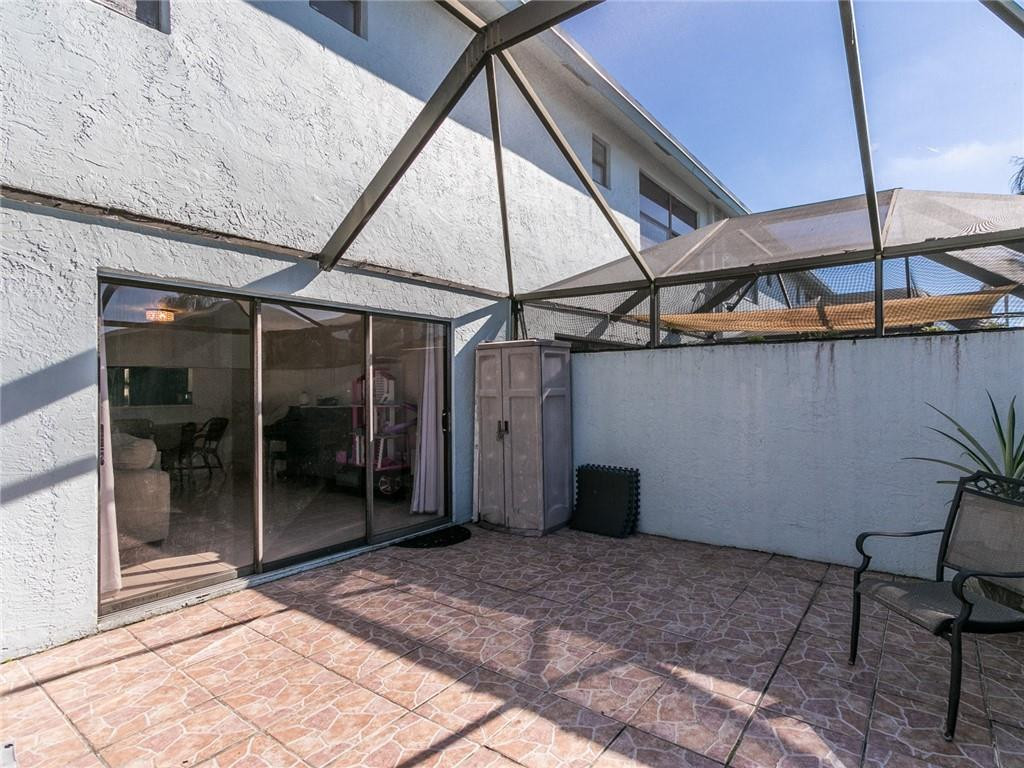 9112 Southwest 21st Court, Unit F Boca Raton, FL 33428 - Photo 10 of 34 a view of a backyard