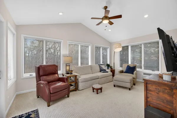 a living room with furniture or couches and a flat screen tv