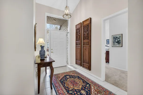 a view of livingroom with furniture and workspace
