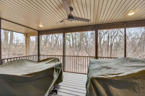 a view of a porch with furniture