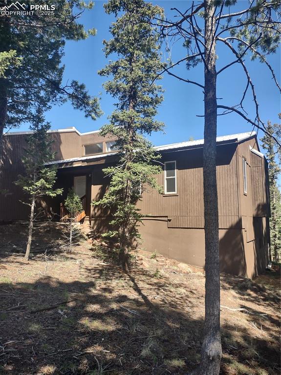 a view of a chairs and tables in the patio