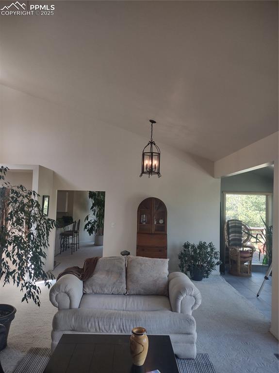 423 Ridge Road Divide, CO 80814 - Photo 12 of 48 a living room with furniture and a large window