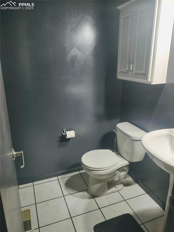 423 Ridge Road Divide, CO 80814 - Photo 34 of 48 a bathroom with a toilet