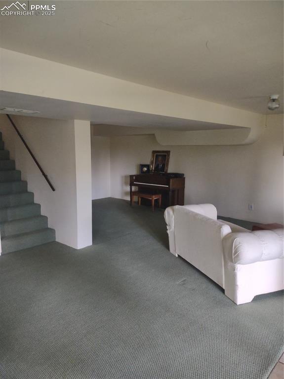 423 Ridge Road Divide, CO 80814 - Photo 42 of 48 a living room with furniture and a kitchen