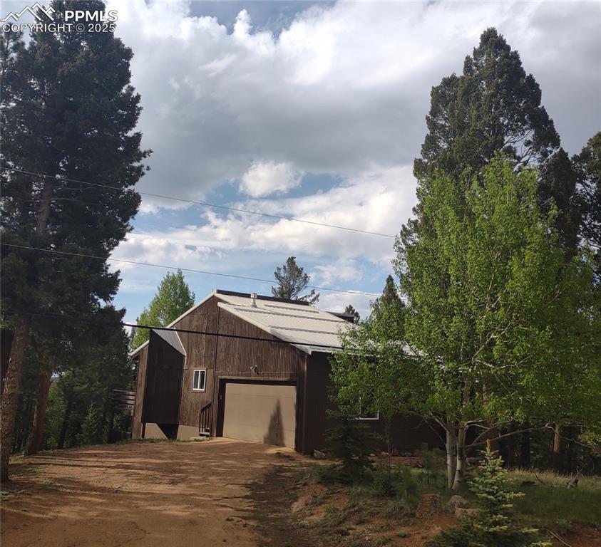423 Ridge Road Divide, CO 80814 - Photo 5 of 48 a view of a street in front of house