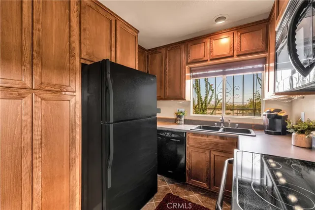 a kitchen with a stove and a microwave