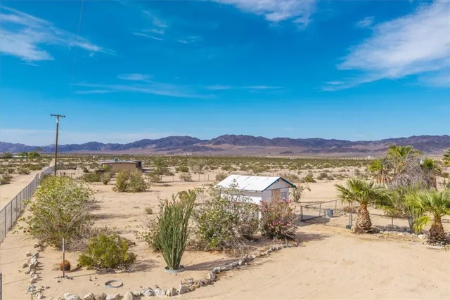 a view of lake with mountain