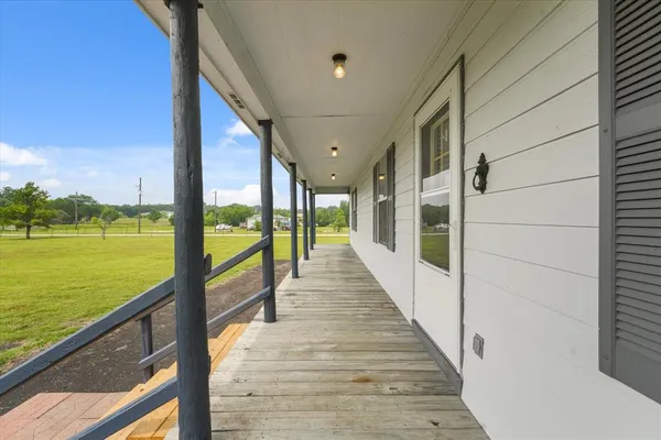 a view of a lake with houses in the background