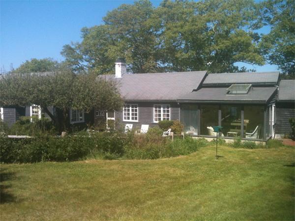 142 Roxy Cahoon Road Plymouth, MA 02360 - Photo 1 of 13 a front view of a house with garden