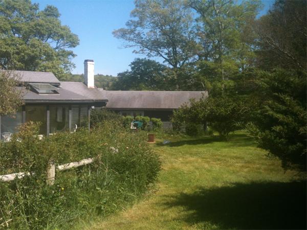 142 Roxy Cahoon Road Plymouth, MA 02360 - Photo 12 of 13 a view of a house with a yard balcony and sitting area