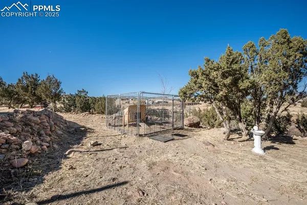 a view of a road with a building in the background