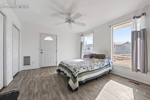 a view of a balcony with chairs