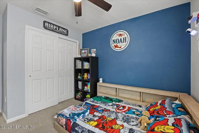 a area with lots of books and a table