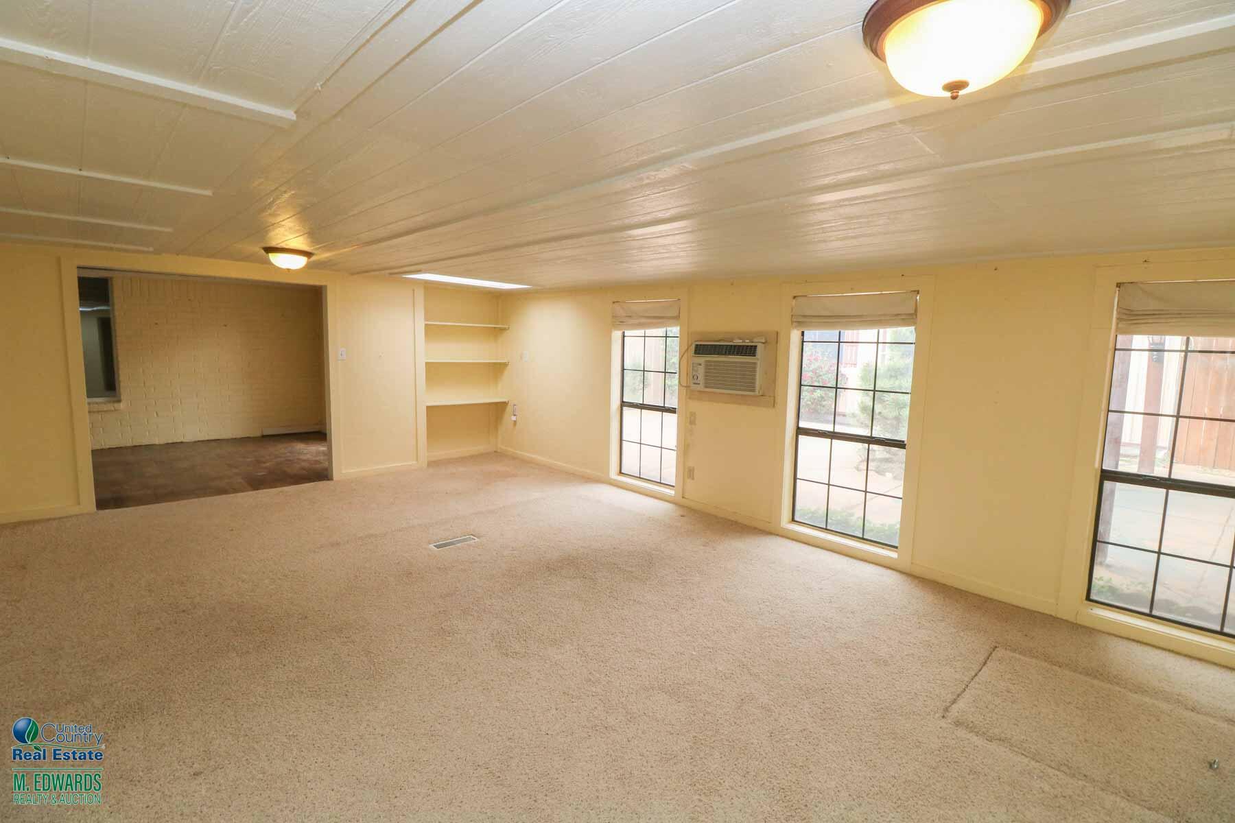 235 East 27th Street Littlefield, TX 79339 - Photo 15 of 21 235 E 27th-Sunroom 2