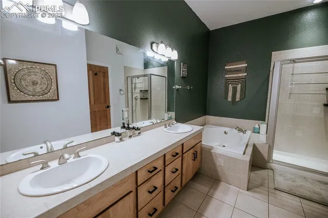 a bathroom with a sink a vanity and a mirror