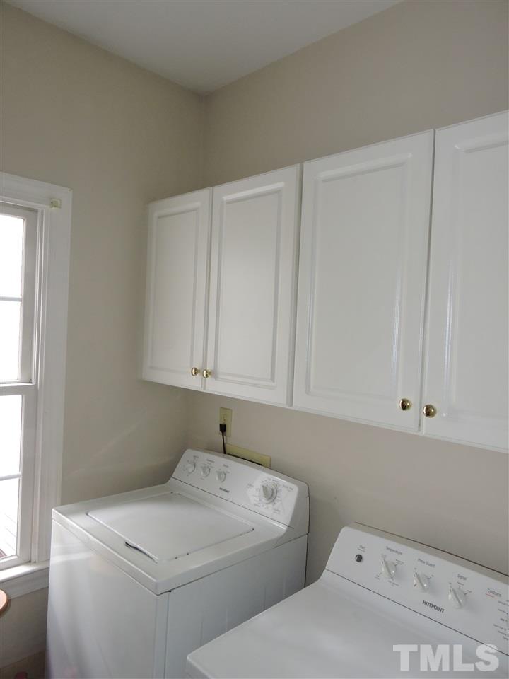 1409 Mill Hill Road Roxboro, NC 27574 - Photo 22 of 25 a utility room with dryer and washer