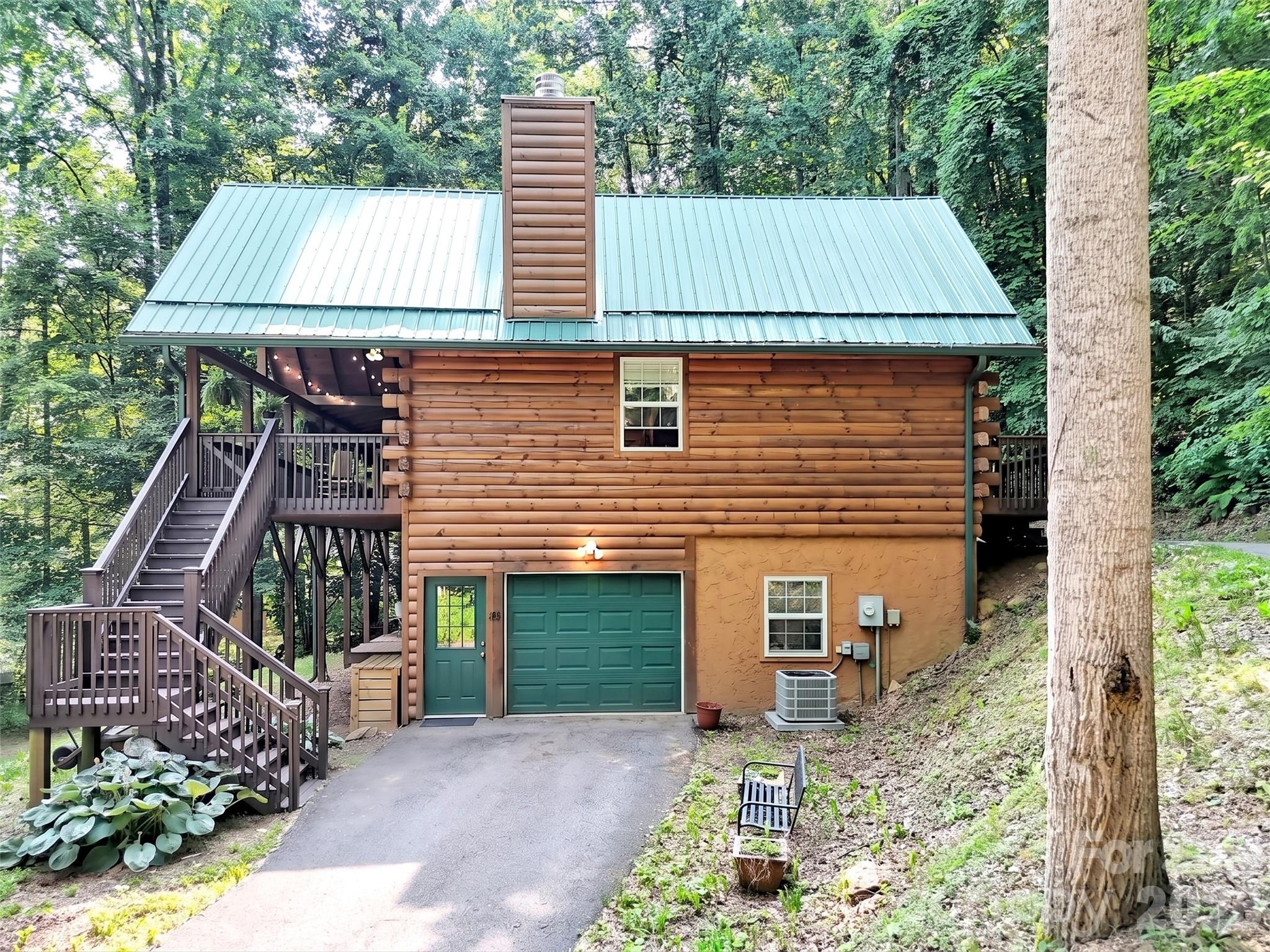 49 Brandywine Road Waynesville, NC 28786 - Photo 29 of 38 front view of a house with a deck