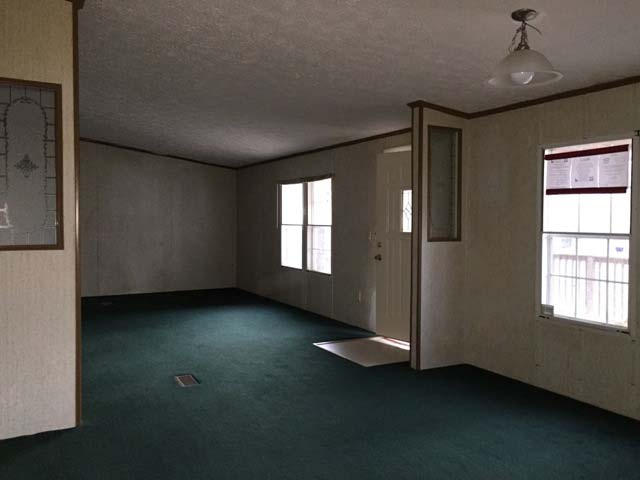 1948 Parker Road Cantonment, FL 32533 - Photo 13 of 28 a view of an empty room with a window