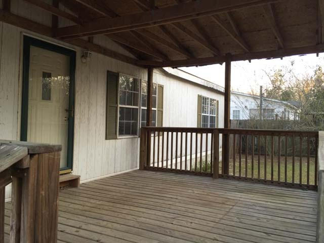 1948 Parker Road Cantonment, FL 32533 - Photo 4 of 28 a view of a balcony with wooden floor