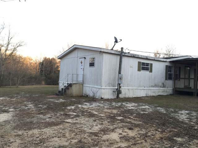 1948 Parker Road Cantonment, FL 32533 - Photo 6 of 28 a view of a house with a backyard
