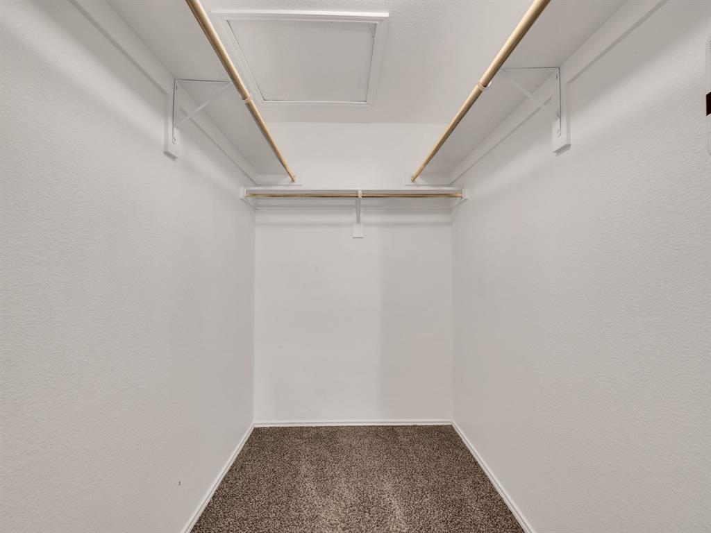 2917 Mayfair Lane Lancaster, TX 75134 - Photo 32 of 40 Walk in closet featuring dark carpet