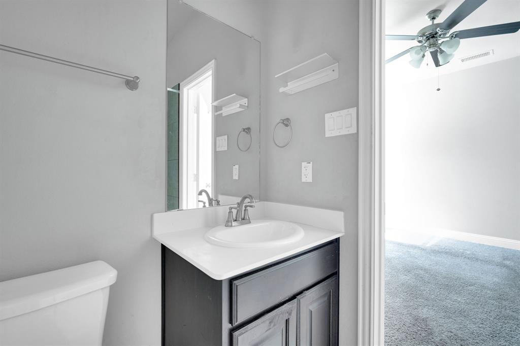117 Melody Way Red Oak, TX 75154 - Photo 26 of 40 Bathroom with vanity, a ceiling fan, and carpet floors